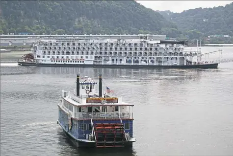  ?? Harrison Jones/Post-Gazette ?? The American Queen riverboat leaves Pittsburgh on Monday from the North Shore.