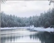  ?? SUNNY QUIGLEY, PARADISE RECREATION AND PARK DISTRICT — CONTRIBUTE­D ?? Snow at Paradise Lake is seen Monday morning in Magalia.