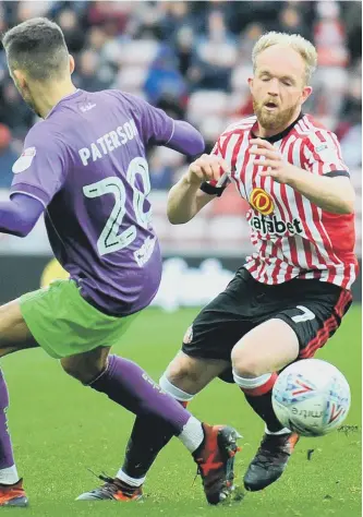  ??  ?? Sunderland’s Jonny Williams takes on Bristol City’s Jamie Paterson on Saturday. Picture by Frank Reid.