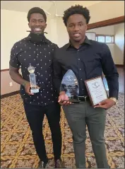  ?? Submitted photo ?? Momodou Mbye, left, poses with Jaylen Smith during a recent ceremony staged by the Providence Gridiron Club at Cranston Country Club. Mbye received the Hometown Hero Award while Smith picked up two awards: Division I-A Back of the Year and the Francis “Monk” Maznicki Award. Like Mybe, Smith played football at Shea High and is now looking forward to suiting up at URI.