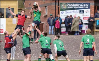  ?? ?? Clogher Valley and Ballina compete for a lineout.