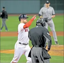  ?? STUART CAHILL / BOSTON HERALD FILE ?? Boston’s Christian Arroyo celebrates his three-run home run during a game against the Yankees at Fenway Park last September.