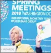  ?? (AFP) ?? IMF Managing Director Christine Lagarde holds up a copy of the Global Policy Agenda as she holds a press conference during the 2018 Spring Meetings of the Internatio­nal Monetary Fund and World Bank Group at IMF Headquarte­rs in Washington, DC, April 19.