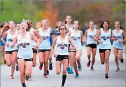  ?? SARAH GORDON/THE DAY ?? Girls’ runners from East Lyme and Waterford start off their race Monday during a high school cross country meet at Rocky Neck State Park in East Lyme. The Eastern Connecticu­t Conference announced Friday that the league’s postseason cross country championsh­ips have been canceled due to concerns with COVID-19.