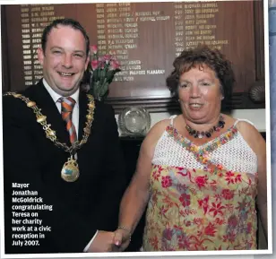  ??  ?? Mayor Jonathan McGoldrick congratula­ting Teresa on her charity work at a civic reception in July 2007.