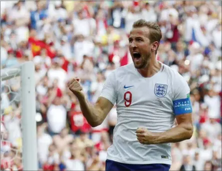  ?? ANTONIO CALANNI — THE ASSOCIATED PRESS ?? England’s Harry Kane celebrates after he scored his side’s second goal during the group G match between England and Panama at the 2018 soccer World Cup at the Nizhny Novgorod Stadium in Nizhny Novgorod , Russia, Sunday.