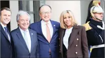  ?? PICTURE: AP ?? French President Emmanuel Macron, with UN Secretary-General Antonio Guterres, second left, World Bank president Jim Yong Kim, and first lady Brigitte Macron at the Élysée Palace, in Paris, yesterday.