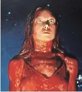  ?? EI SCAN ?? Sissy Spacek as Carrie White gets drenched with pig blood at the prom in this scene from the Stephen King adaptation “Carrie.”