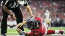  ?? ERIC CHRISTIAN SMITH — THE ASSOCIATED PRESS FILE ?? Houston QB Tom Savage (3) is checked by a referee after he was hit gainst the 49ers, in Houston. Savage left the game and it was later determined he had a concussion.