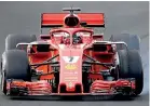  ??  ?? Ferrari's Finnish driver Kimi Raikkonen takes part in the tests for the new Formula One Grand Prix season at the Circuit de Catalunya in Montmelo on the outskirts of Barcelona - AFP