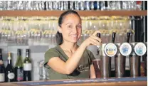  ?? PHOTO: PAULINA CORVALAN ?? Draining the tap . . . Due to staffing shortages, owners such as Paulina Corvalan have needed to adapt their businesses to stay afloat.