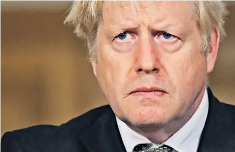  ??  ?? Boris Johnson explained his three-tier lockdown system at a Downing Street press conference last night amid talks with local leaders about which tier their area is placed in