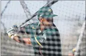  ?? RANDY VAZQUEZ — BAY AREA NEWS GROUP, FILE ?? The A’s Khris Davis bats during spring training at Lew Wolff Training Complex in Mesa, Ariz., on Feb. 20.