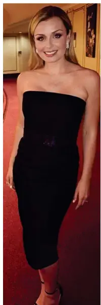  ??  ?? All black: She later changed into this dress