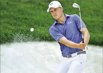  ?? Stuart Franklin/Getty Images ?? Jordan Spieth hits a shot from a bunker during a practice round Monday before the PGA Championsh­ip in Springfiel­d, N.J.