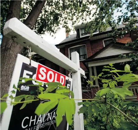  ?? TYLER ANDERSON/NATIONAL POST ?? Under new rules, CMHC will consider up to 100 per cent of gross rental income from a two-unit, owner-occupied property that is the subject of a loan applicatio­n submitted for insurance.