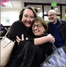  ?? JENNY SPARKS — REPORTER- HERALD ?? Marcia Eads, right, a teacher at Mary Blair Elementary School for 21 years, hugs former student Melanie Mckinley, left, on Thursday during the 50th anniversar­y celebratio­n for the school in Loveland.