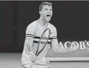  ?? [AP PHOTOS] ?? Bulgaria’s Grigor Dimitrov celebrates after defeating Australia’s Nick Kyrgios on Sunday during his fourth round match at the Australian Open tennis championsh­ips in Melbourne, Australia.