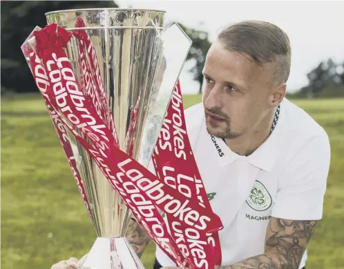  ??  ?? Leigh Griffiths helped Celtic finish 39 points ahead of Rangers last season. He said King is ‘mad’ if he thinks the gap should be bigger.