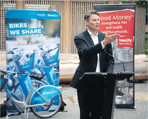  ?? MIKE BELL/PNG ?? Vancouver Mayor Gregor Robertson speaks at the announceme­nt of the expansion of the Vancouver Bike Share program at Britannia Community Services Centre on Thursday.