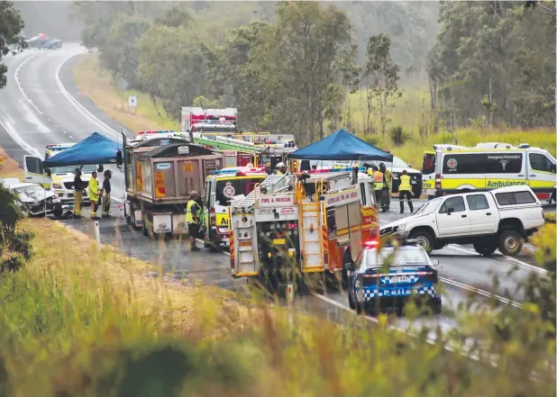  ??  ?? TRAGIC ACCIDENT: A 101-year-old woman died and several people were injured in a three-car smash on the Kennedy Highway at Koah yesterday. Picture: ANDREA FALVO