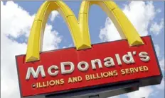  ?? Gene J. Puskar/Associated Press ?? This June 25, 2019, file photo shows a McDonald’s sign outside one of the fast-food chain’s locations in Pittsburgh.