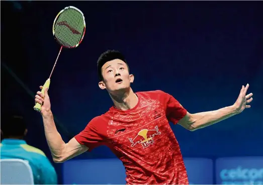  ??  ?? Solid show: Chen long of China in action against Hong Kong’s Wong Wing Ki during the second round of the Malaysian Open at the Malawati Stadium in Shah Alam yesterday. Chen long won 21-17, 21-12. — S.S. KANESAN / The Star