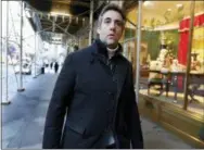  ?? RICHARD DREW — THE ASSOCIATED PRESS ?? Michael Cohen, former lawyer to President Donald Trump, leaves his apartment building on New York’s Park Avenue. In the latest filings Friday, prosecutor­s will weigh in on whether Cohen deserves prison time and, if so, how much.