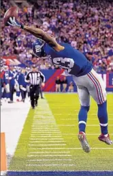  ?? Al Bello Getty Images ?? ODELL BECKHAM JR. of the Giants had one of the signature plays of the 2014 NFL season.