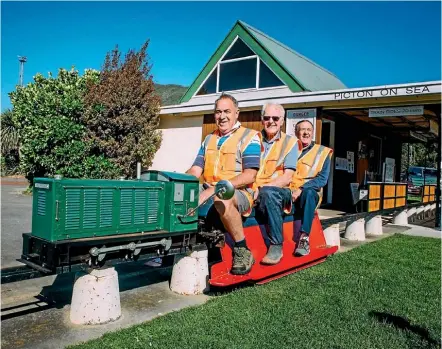  ?? DAVID JAMES/STUFF ?? Graham Lowe, Picton Society of Model Engineers volunteer Graham Low, Kerry Johnson, and Brian Henstock would like more volunteers to join the Picton Society of Model Engineers.