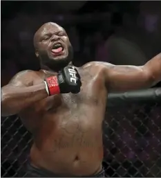  ?? PHOTO/ ?? Derrick Lewis celebrates after defeating Alexander Volkov during a heavyweigh­t mixed martial arts bout at UFC 229 in Las Vegas, on Saturday. AP JOHN LOCHER