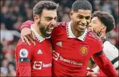  ?? Alex Livesey / Getty Images ?? Bruno Fernandes, left, celebrates with Manchester United teammate Marcus Rashford after a goal on Feb. 4.