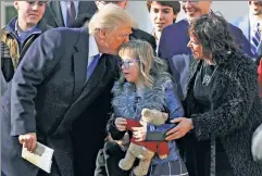  ?? ?? More than words: Trump greets a girl at the 2018 March for Life rally.