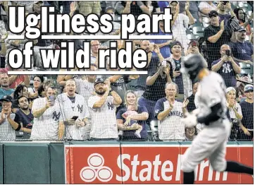  ?? AP ?? HOME AWAY FROM HOME: Yankees fans who invaded Camden Yards cheer as Aaron Judge rounds the bases following his first-inning homer in Tuesday’s win.