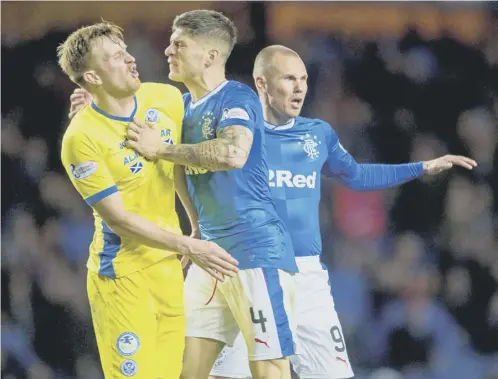  ??  ?? 0 Rangers’ No 4 Rob Kiernan confronts St Johnstone midfielder Liam Craig during last night’s Ladbrokes Premiershi­p draw at Ibrox.