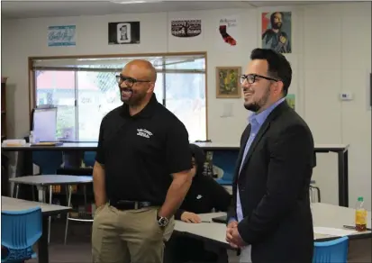  ?? ANTHONY VOLKAR — COURTESY ?? Yolo County Superinten­dent of Schools Garth Lewis and Supervisor Angel Barajas tour a classroom at Cesar Chavez Community School in Woodland on Friday.