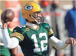  ?? JEFFREY PHELPS/AP ?? Packers quarterbac­k Aaron Rodgers passes against the Buccaneers during the NFC championsh­ip game Sunday in Green Bay, Wis.