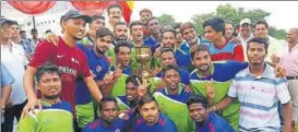  ?? DFA ?? Sunrise Club team players pose with winners trophy in Lucknow.