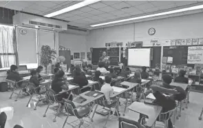  ?? KYLE ROBERTSON/COLUMBUS DISPATCH ?? An air conditioni­ng unit, top left, was added to this sixth-grade classroom upgrade at Sherwood Middle School in Columbus in 2019, as part of Operation: Fix It, the five-year, $125-million plan funded by a 2016 bond issue to repair Columbus City Schools facilities.