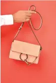  ??  ?? A SMALL Chloé Faye shoulder bag is one of many iconic designer items that have been gathered into one boutique called ICONIC at Rustan’s Makati.