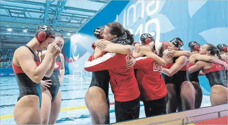  ?? DAVE HOLLAND, CANADIAN OLYMPIC COMMITTEE ?? Team Canada celebrates their win over Brazil in the women's water polo semifinal at the Lima 2019 Pan American Games Friday.