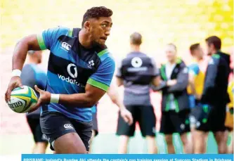  ?? — AFP ?? BRISBANE: Ireland’s Bundee Aki attends the captain’s run training session at Suncorp Stadium in Brisbane on Friday, ahead of the rugby match between Australia and Ireland.