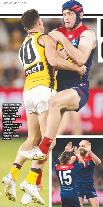  ?? ?? Angus Brayshaw marks despite the efforts of Hawthorn’s Jaeger O’Meara; (inset) Max Gawn is congratula­ted by Ed Langdon at the MCG on Saturday. Pictures: Getty Images