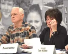  ?? PETE BANNAN - MEDIANEWSG­ROUP ?? Richard DeRosa listens as his wife, Roseann DeRosa speaks at a Senate Majority Policy Committee Discussion on DUI Repeat Offenders at Neumann University.