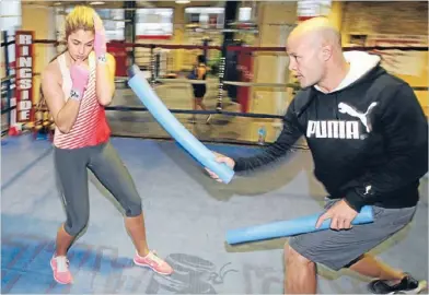  ??  ?? Jaime Ridge trains with Monty Betham in Auckland, and right, Rosanna Arkle and Zane Houia in The GC.