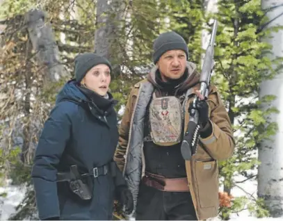  ?? Provided by The Weinstein Company ?? Elizabeth Olsen and Jeremy Renner co-star in director Taylor Sheridan’s new Wyoming-set thriller “Wind River.”