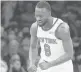  ?? ADAM HUNGER/AP ?? Knicks guard Kemba Walker celebrates after hitting a 3-pointer against the Washington Wizards on Thursday in New York.