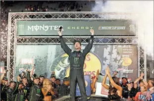  ?? / Getty Images-Brian Lawdermilk ?? Kurt Busch celebrates after winning Saturday night’s Cup race at Bristol. It was the first win for the older Busch brother since the 2017 Daytona 500.