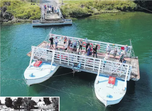  ?? PHOTOS: STEPHEN JAQUIERY/OTAGO ?? All aboard . . . Visitors to the Picnic at the Punt Tuapeka Mouth Punt 125th jubilee yesterday celebrate with a ride across the Clutha River, under the helmsmansh­ip of punt operator Tom Jones (rear, third from left). Inset: The punt in 1913. WITNESS