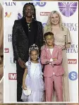  ?? ?? JOY Ravi and family at PoB awards. Left, with Lionesses